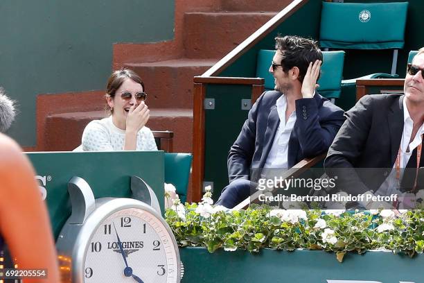Actors Anais Demoustier and Jeremie Elkaim attend the 2017 French Tennis Open - Day Height at Roland Garros on June 4, 2017 in Paris, France.
