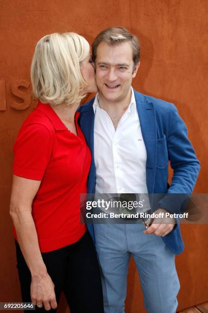 Journalist Laurence Ferrari and her companion Violonist Renaud Capucon attend the 2017 French Tennis Open - Day Height at Roland Garros on June 4,...