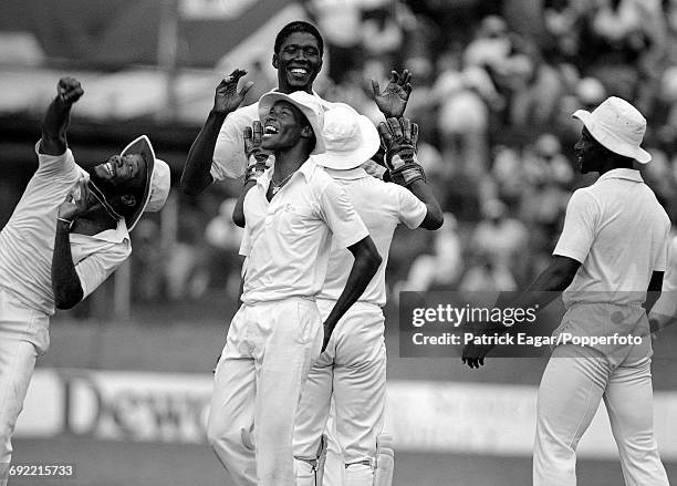 West Indies cricketers Malcolm Marshall, Carlisle Best, Joel Garner, Thelston Payne and Richie Richardson celebrate a wicket during the 2nd Test...