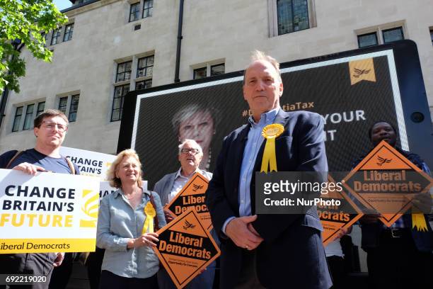Simon Hughes reveals a new campaign poster of attacking Theresa May accompanied by the words: &quot;Don't bet your house on her.&quot; in London on...