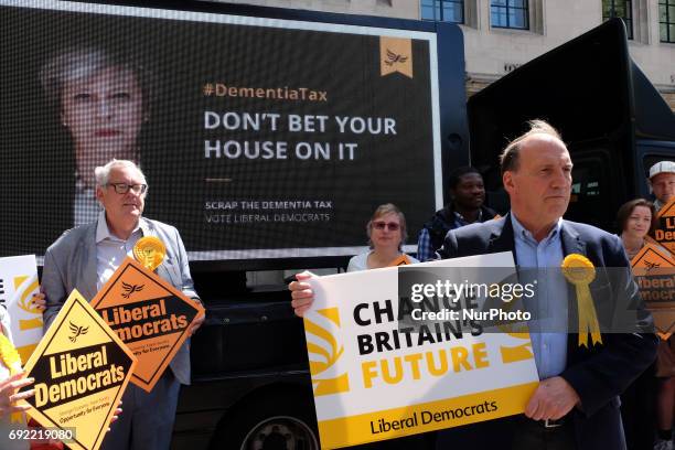 Simon Hughes reveals a new campaign poster of attacking Theresa May accompanied by the words: &quot;Don't bet your house on her.&quot; in London on...