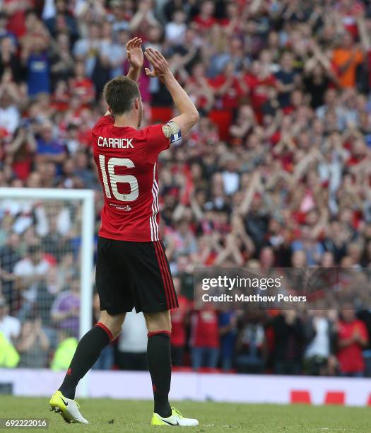 Michael Carrick of Manchester United '08 XI walks off after being substituted during the Michael Carrick Testimonial match between Manchester United...