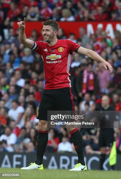 Michael Carrick of Manchester United '08 XI celebrates scoring their second goal during the Michael Carrick Testimonial match between Manchester...