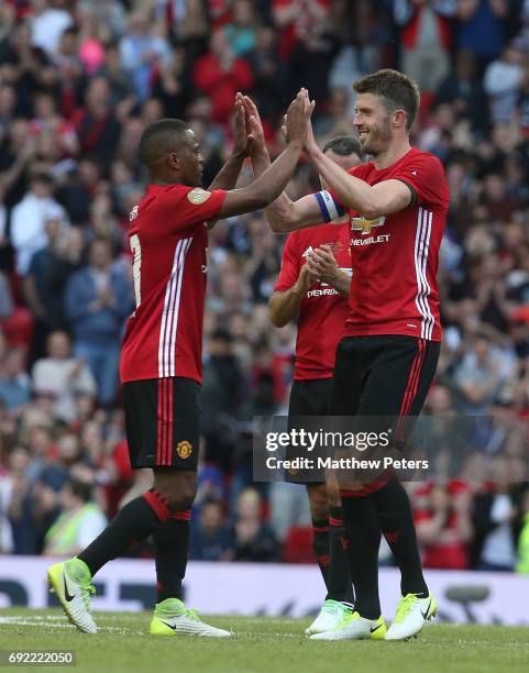 Michael Carrick of Manchester United '08 XI walks off after being substituted during the Michael Carrick Testimonial match between Manchester United...