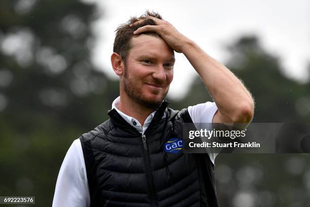 Chris Wood of England reacts as he leaves the 18th green during day four of the Nordea Masters at Barseback Golf & Country Club on June 4, 2017 in...