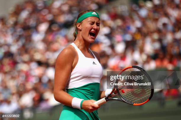 Kristina Mladenovic of France celebrates victory in the ladies singles fourth round match against Gabine Muguruza of Spain on day eight of the 2017...