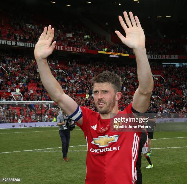 Michael Carrick of Manchester United '08 XI walks off after the Michael Carrick Testimonial match between Manchester United '08 XI and Michael...