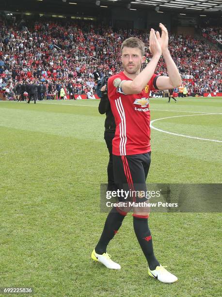 Michael Carrick of Manchester United '08 XI walks off after the Michael Carrick Testimonial match between Manchester United '08 XI and Michael...