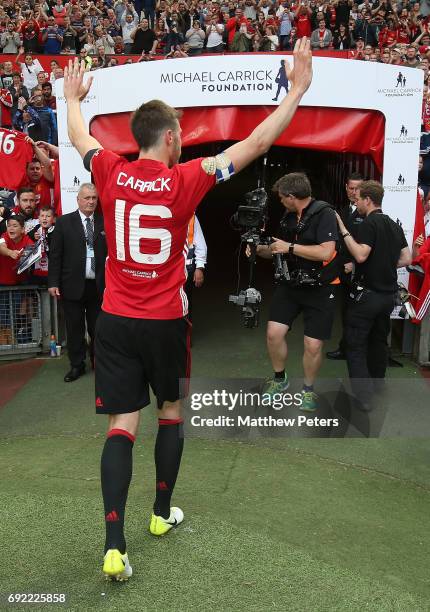 Michael Carrick of Manchester United '08 XI walks off after the Michael Carrick Testimonial match between Manchester United '08 XI and Michael...