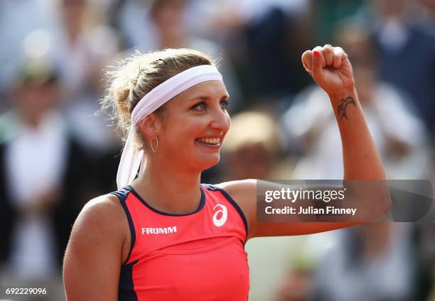 Timea Bacsinszky of Switzerland celebrates victory in her women's singles fourth round match against Venus Williams of the United States during day...