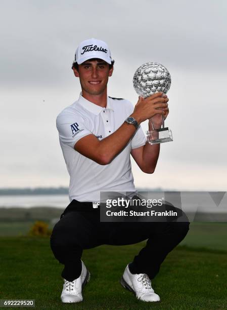 Renato Paratore of Italy holds the winners trophy after winning The Nordea Masters at Barseback Golf & Country Club on June 4, 2017 in...