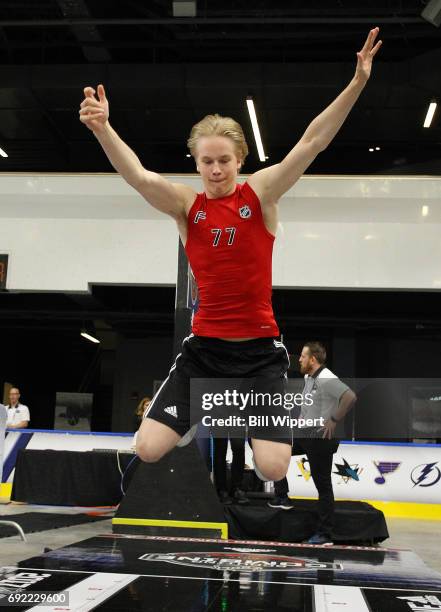 Elias Pettersson performs the long jump during the NHL Combine at HarborCenter on June 3, 2017 in Buffalo, New York.