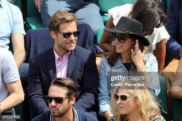 Actor Jamie Bamber and his wife singer Kerry Norton are spotted on central court at Roland Garros on June 4, 2017 in Paris, France.