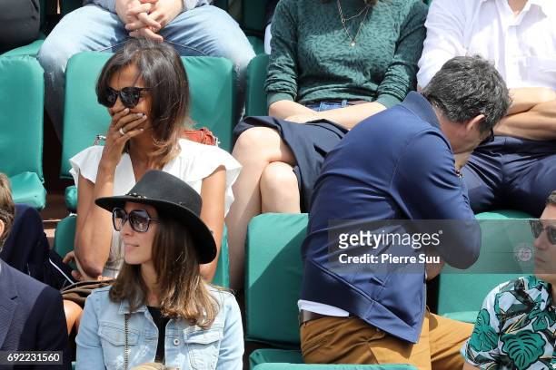 Tv presenters Stephane Plaza and Karine Le Marchand are spotted on central court at Roland Garros on June 4, 2017 in Paris, France.