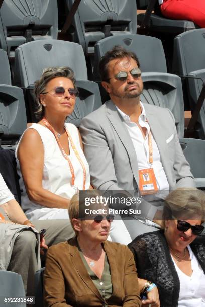 Ex finalist Henri Leconte and fiancee Maria Dowlatshahi are spotted at Roland Garros on June 4, 2017 in Paris, France.