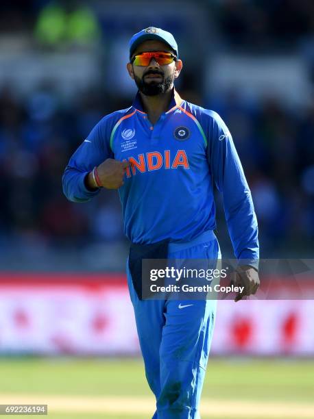 Virat Kohli of India points to his chest during the ICC Champions Trophy match between India and Pakistan at Edgbaston on June 4, 2017 in Birmingham,...