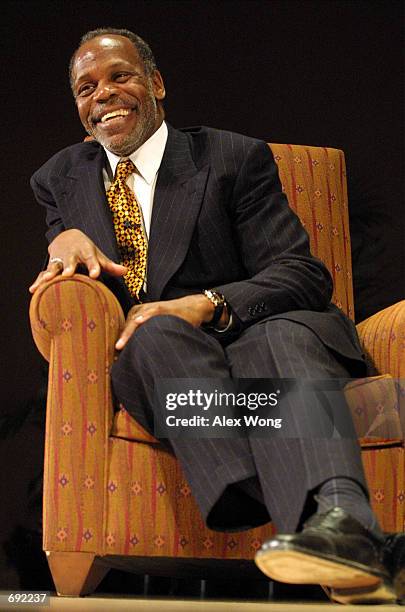 Actor Danny Glover speaks as he is interviewed during an event celebrating Martin Luther Kings birthday January 17, 2002 at Smithsonians National...