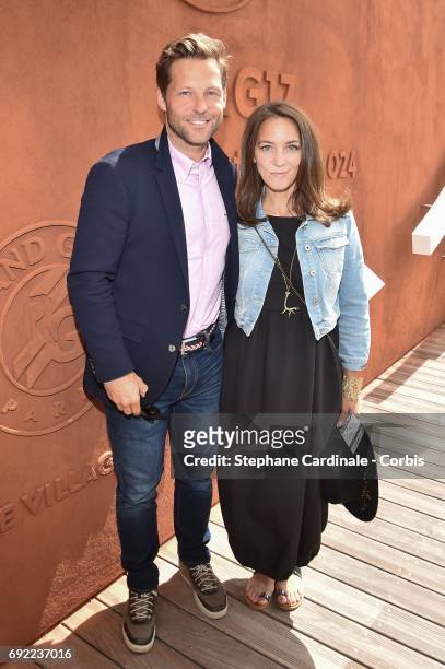 Actors Jamie Bamber and his wife Kerry Norton attend the 2017 French Tennis Open - Day Height at Roland Garros on June 4, 2017 in Paris, France.