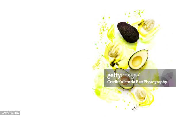 fruit: avocado isolated on white background. creative food shot with watercolor. - avocado isolated imagens e fotografias de stock
