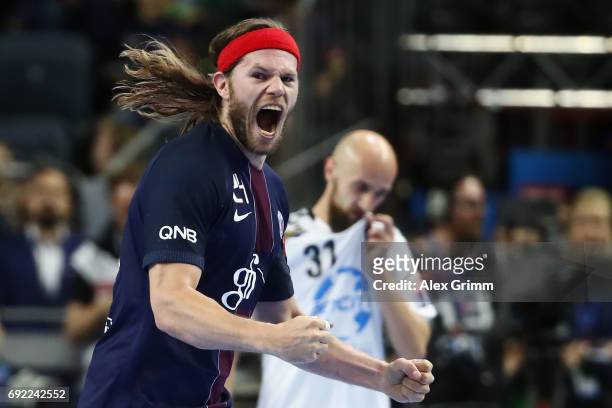 Mikkel Hansen of Paris celebrates a goal during the VELUX EHF FINAL4 final between Paris Saint-Germain Handball and HC Vardar at Lanxess Arena on...