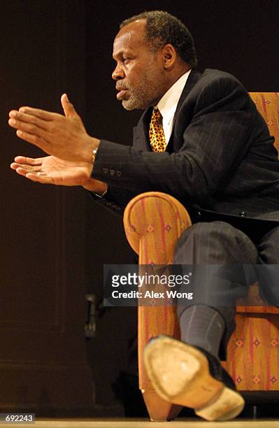 Actor Danny Glover speaks as he is interviewed during an event celebrating Martin Luther Kings birthday January 17, 2002 at Smithsonians National...