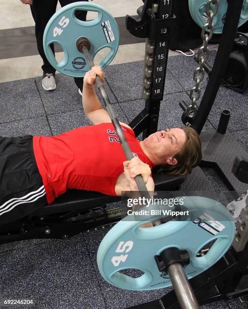Miro Heiskanen performs the bench press during the NHL Combine at HarborCenter on June 3, 2017 in Buffalo, New York.