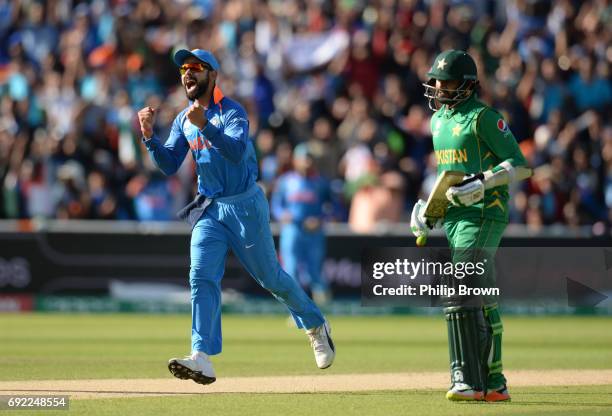 Virat Kohli of India celebrates after the dismissal of Azhar Ali of Pakistan during the ICC Champions Trophy match between India and Pakistan at...