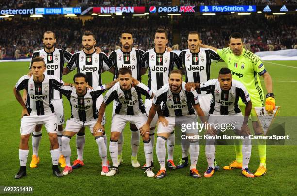 Juventus line up before kick-off during the UEFA Champions League Final match between Juventus and Real Madrid at National Stadium of Wales on June...