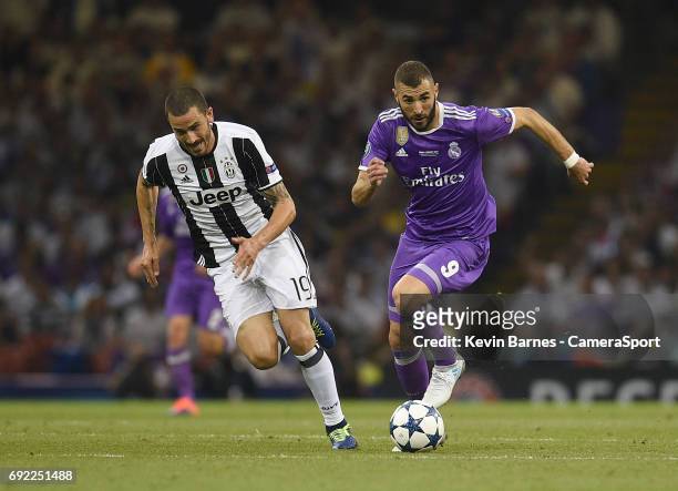 Karim Benzema of Real Madrid under pressure from Leonardo Bonucci of Juventus during the UEFA Champions League Final match between Juventus and Real...