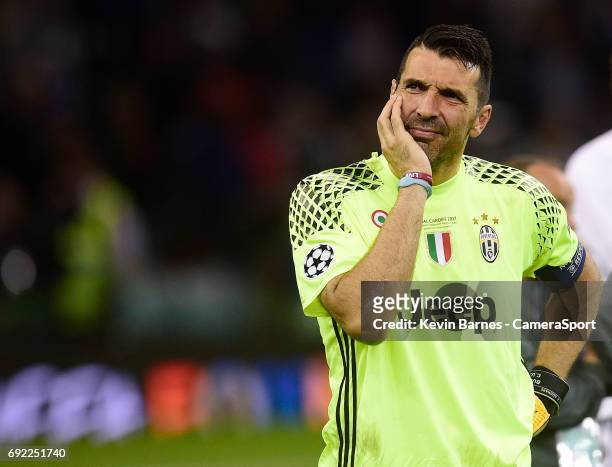 Gianluigi Buffon of Juventus looks dejected after his sides defeat during the UEFA Champions League Final match between Juventus and Real Madrid at...