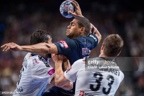 Daniel Narcisse of Paris is attacked by the defense of Vardar during the VELUX EHF FINAL4 Final match between Paris Saint-Germain Handball and HC...