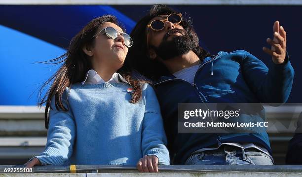 Nita Ambani and Bollywood actor Ranveer Singh watch from the stands during the ICC Champions Trophy match between India and Pakistan at Edgbaston on...