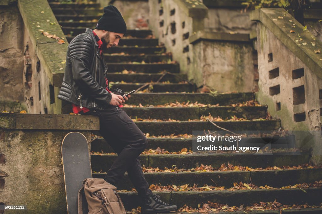 Skater relaxing outdoors