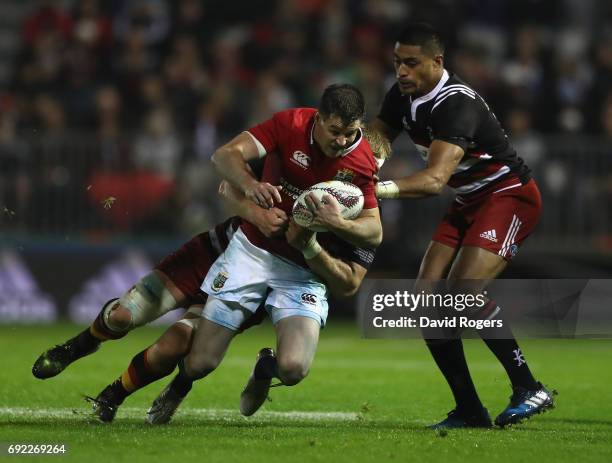 Jonathan Sexton of the Lions is tackled during the match between the New Zealand Provincial Barbarians and the British & Irish Lions at Toll Stadium...