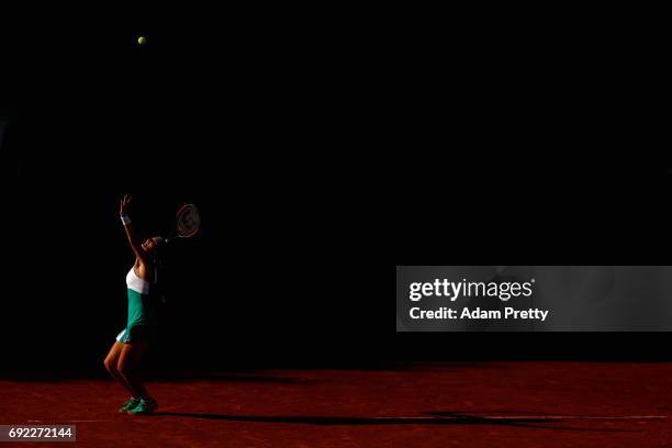 Kristina Mladenovic of France, partner of Svetlana Kuznetsova of Russia serves during the ladies doubles match against Jana Capelova of Sloavakia and...