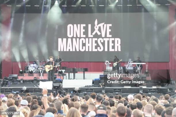 Free for editorial use. In this handout provided by 'One Love Manchester' benefit concert Marcus Mumford performs on stage on June 4, 2017 in...