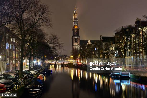 amsterdam by night - prinsengracht and the westerkerk - noite stock pictures, royalty-free photos & images