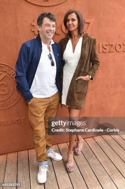 Hosts Stephane Plaza and Karine Le Marchand attend the 2017 French Tennis Open - Day Height at Roland Garros on June 4, 2017 in Paris, France.