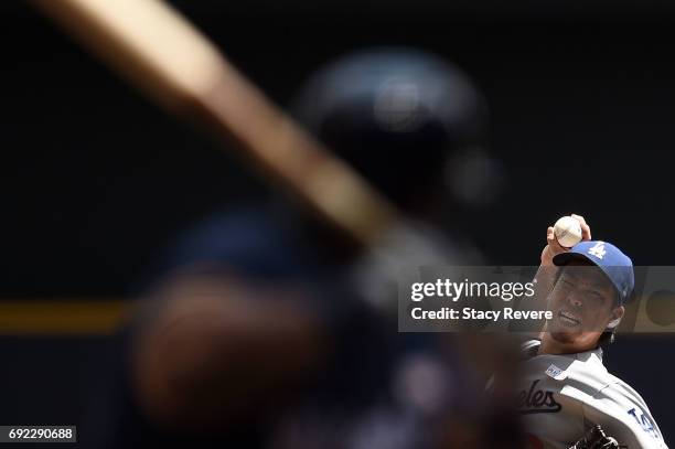 Kenta Maeda of the Los Angeles Dodgers throws a pitch during the third inning of a game against the Milwaukee Brewers at Miller Park on June 4, 2017...