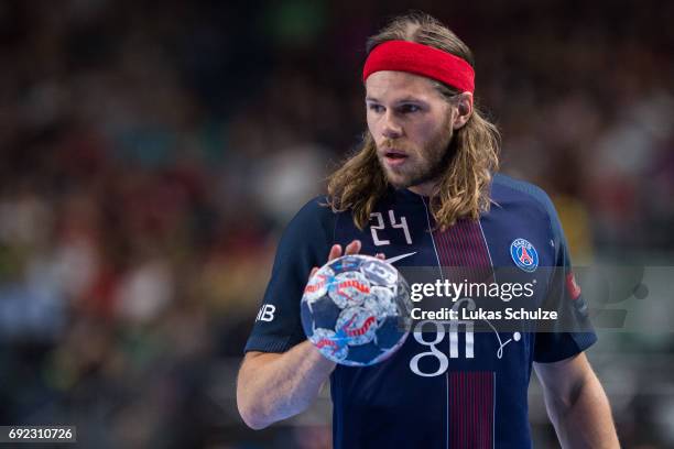 Mikkel Hansen of Paris holds the ball during the VELUX EHF FINAL4 Final match between Paris Saint-Germain Handball and HC Vardar at Lanxess Arena on...