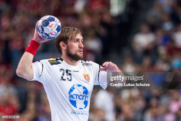 Luka Cindric of Vardar holds the ball during the VELUX EHF FINAL4 Final match between Paris Saint-Germain Handball and HC Vardar at Lanxess Arena on...