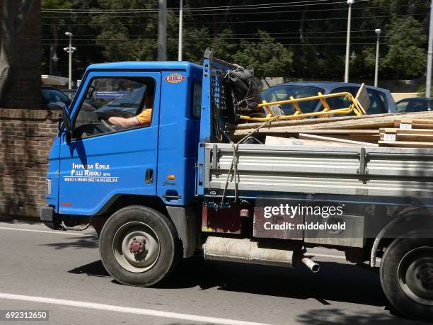 Contractor Loading 365 Contractor Loading Truck Stock Photos, High-Res Pictures, and ...