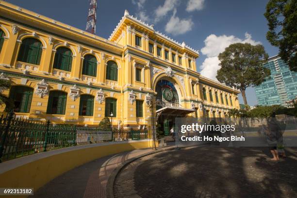 saigon central post office in everning - ancient roman flag stock-fotos und bilder