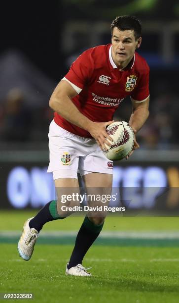 Jonathan Sexton of the Lions runs with the ball during the match between the New Zealand Provincial Barbarians and the British & Irish Lions at Toll...