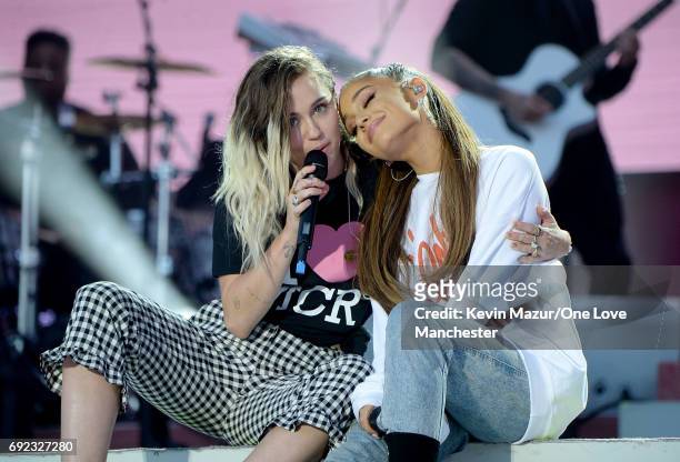 Ariana Grande and Miley Cyrus perform on stage during the One Love Manchester Benefit Concert at Old Trafford Cricket Ground on June 4, 2017 in...