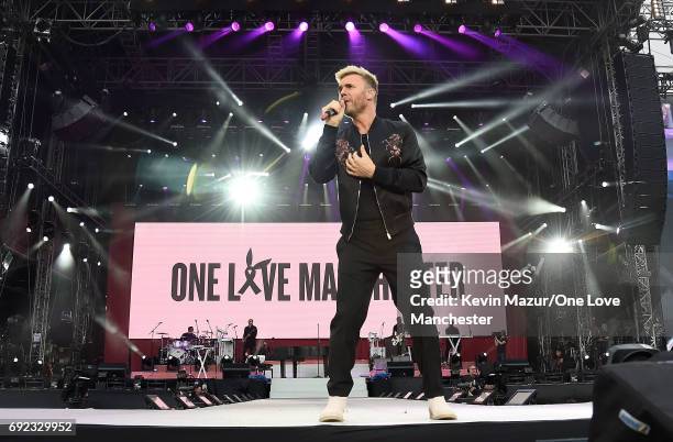 Gary Barlow of Take That performs on stage during the One Love Manchester Benefit Concert at Old Trafford Cricket Ground on June 4, 2017 in...