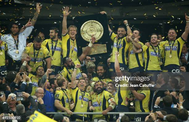 Aurelien Rougerie, Damien Chouly, Morgan Parra, Camille Lopez of ASM Clermont celebrate the victory during the Bouclier de Brennus trophy...