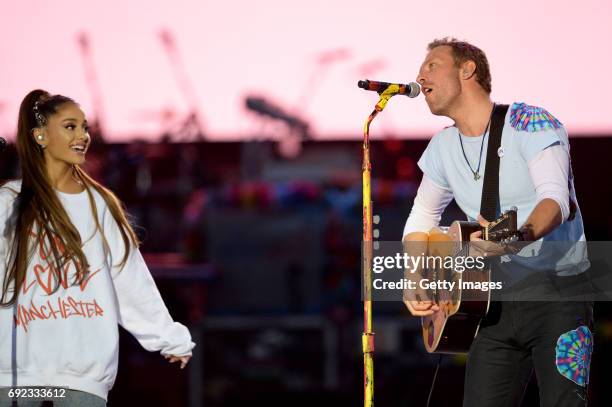 Free for editorial use. In this handout provided by 'One Love Manchester' benefit concert Ariana Grande and Chris Martin perform on stage on June 4,...