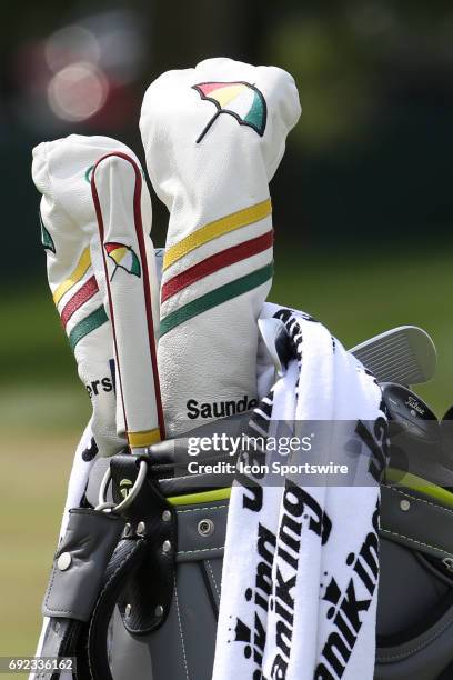 The head covers on the bag of PGA golfer Sam Saunders who is Arnold Palmer's grandson has the Palmer logo on them during the Memorial Tournament -...