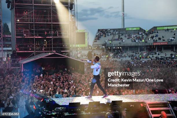 Chris Martin of Coldplay performs on stage during the One Love Manchester Benefit Concert at Old Trafford Cricket Ground on June 4, 2017 in...